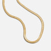 Elisa-Marie – Gently curved gold necklace.