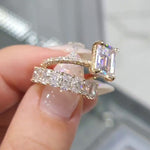 Nadja – Rectangular center diamond ring.