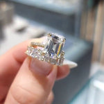 Nadja – Rectangular center diamond ring.