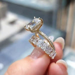 Nadja – Rectangular center diamond ring.