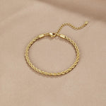 Isabela - Pulsera dorada trenzada chic