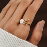 Miriam – Engagement ring with white floral embellishment.