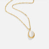 Veronika – Collar dorado doble con acentos negros.