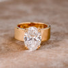 Lara - Round solitaire ring in a gold finish.