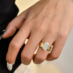 Lara - Round solitaire ring in a gold finish.